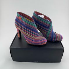 Brand New, Never Been Worn! These Shoes Are A Conversation Starter With Their Vibrant Stripes And Eye-Catching Design. The Fold Hi Is A Sleek High Heel Ankle Bootie That Is Elevated By A Sturdy Tapered Heel. A Slightly Wider Footbed And Rounded Toe Gives The Shoe Its Distinct Style While Also Ensuring A Comfortable Fit. Approximately 3.75” Heel. Comes With Box, Two Sets Of Replacement Heel Taps And Small Catalog. From A Smoke Free Home. Casual Multicolor High Heel Boots, Green Ankle-high Heeled Boots For Spring, Ankle-high Booties With Stacked Heel And Medium Width, Beige Stacked Heel Ankle-high Booties, Green Ankle-high Boots With Reinforced Heel, Multicolor Ankle-high Heels, Heel Taps, Nude Boots, United Nude