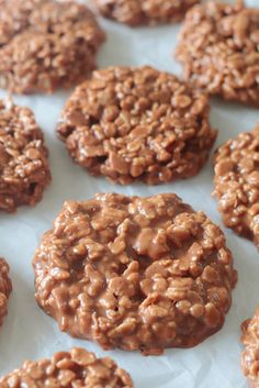 cookies with chocolate flakes are on a sheet of wax paper and ready to be eaten