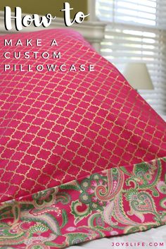 a pink pillow sitting on top of a bed with the words how to make a custom pillow