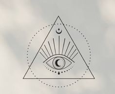 an all seeing triangle with the moon and sun in it's center on a cloudy day