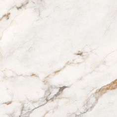 a white marble textured surface with brown accents