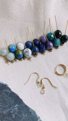 1. Green Jade  2. Azurite  3. Howlite  4. Sodalite 5. Lapis Lazuli  6. Lepidolite  7. Apatite  8. Onyx  Entire earring approx: 2-2.5cm Dangle below earlobe approx: 1.5cm Do note that your purchase will not be the exact beads shown in the photographs. Every rock is different in colour and markings. Purchase only if you are fine with that. Thank you! Earring Hoops, Green Jade, Jade Green, Star Earrings, Lapis Lazuli, The Rock, Fashion Earrings, Jewelry Earrings Dangle, Onyx