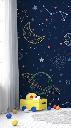 a child's room with space wallpaper and toys