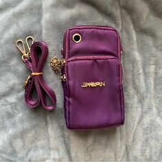 Brand New Without Tags! Satiny Feel Fun Bright Purple Color Beautiful Teal Green Interior Lining 3 Zipper Compartments Cleaning Out My Closet And Trying To Find New Homes For Things That Are In Excellent, If Not Perfect/Never Used Condition! Purple Phone Bag With Cell Phone Pocket, Purple Crossbody Phone Bag With Cell Phone Pocket, Trendy Purple Shoulder Bag With Cell Phone Pocket, Trendy Purple Phone Bag For Daily Use, Trendy Purple Shoulder Bag With Pockets, Casual Purple Shoulder Bag With Phone Pocket, Daily Use Purple Crossbody Phone Bag, Green Interior, Green Interiors