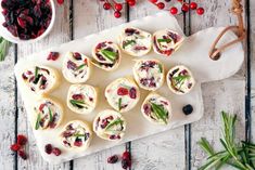 small appetizers with cranberry sauce and herbs