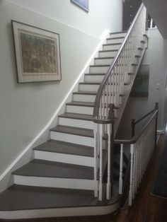 the stairs in this house are painted white