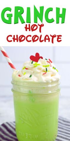 a green drink with whipped cream and sprinkles