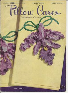 an old book with crocheted flowers on the front and back cover that says pillow cases