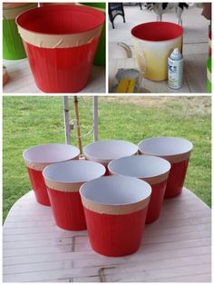 red buckets sitting on top of a white table