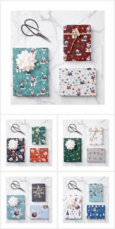 several different types of wrapping paper and scissors on a marble counter top with flowers, snowflakes, and stars