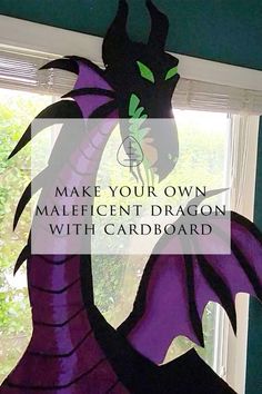 a paper cut out of a dragon with the words make your own maleficent dragon with cardboard