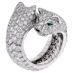 Cartier Panthere Ring, with double Lakarda diamond panthers facing each other. The Panthere de Cartier ring, made in 18K white gold, set with 356 brilliant-cut diamonds, totaling 5.04cts. Eyes and nose: emeralds, onyx. Serial 9387**. With a Cartier certificate. Size 5.75 Cartier Panther Ring, Panther Ring, Cartier Panthere, Head Ring, Double Diamond, White Gold Set, Pave Diamond Ring, Cartier Ring, Gold Set