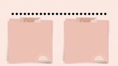 two pink folders with black dots on them are next to each other and one has a note attached to it