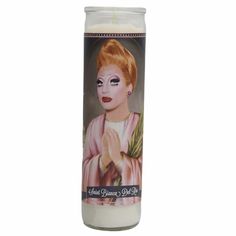 a candle with a picture of a woman on it