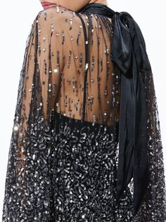 Zenon Sequin Cape Mini Dress In Black/silver Embellished Mini Length Sequin Fabric For Cocktail, Evening Sequin Mini Dress With Contrast Details, Evening Mini Dress With Contrast Sequin, Sequin Embellished Mini Dress For Evening, Embellished Sequin Mini Dress For Cocktail, Mini Length Contrast Sequin Dress For Gala, Contrast Sequin Mini Dress For Gala, Contrast Sequin Mini Length Evening Dress For Cocktail, Cocktail Evening Dress With Contrast Sequin In Mini Length