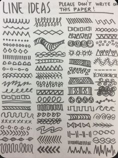 some doodles are drawn on paper and have been placed in the shape of letters