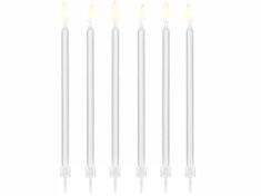 five white candles are lined up next to each other