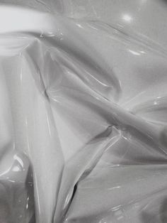 an image of white fabric that looks like plastic