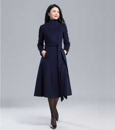 "★★ FEATURES 50% wool, other fiber,nylon Polyester lining Two side pockets Snap closure Belted wool coat Long sleeve A Line coat Perfect for winter, autumn Dry clean Fabric swatch https://etsy.me/3yprD9Q Size Chart https://etsy.me/3skS1Aq ★★Mode size Height 170cm (5′ 7″) Bust 84 cm (33\") Waist 66 cm (26\") She wears size XS. ★★ Custom order selection, Will charge 20USD-70USD custom fees Request other color Request Chang the Length Request Chang the sleeve length Your height is not between 155cm Autumn Outfits Pear Shape, Solid Knee-length Winter Outerwear, Knee-length Winter Workwear Outerwear, Knee-length Winter Outerwear For Work, Elegant Knee-length Winter Outerwear, Fitted Knee-length Winter Outerwear, Fitted Knee-length Outerwear For Winter, Asymmetrical Winter Workwear Outerwear, Asymmetrical Winter Outerwear For Work