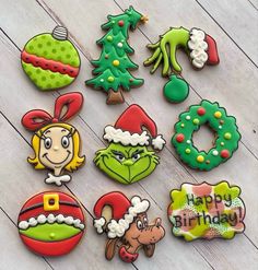 the grinch christmas cookies are decorated with different designs and colors, including one for each cookie