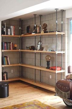 an empty room with several shelves on the wall