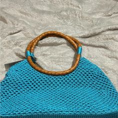 Teal The Sak Mesh Bad Brand New With Tag Blue Shoulder Bag With Leather Handles For Beach, Blue Top Handle Shoulder Bag For Summer, Blue Leather Handle Shoulder Bag For Summer, Blue Summer Bags With Bamboo Handle, Chic Blue Shoulder Bag With Braided Handles, Blue Everyday Bags With Bamboo Handle, Blue Beach Bags With Leather Handles, Blue Vacation Bag With Bamboo Handle, Blue Bags With Bamboo Handle For Everyday Use