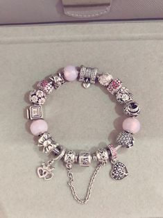 Pandora Bracelet Simple, Aesthetic Pandora Bracelet Ideas, Pandora Bracelet Aesthetic Pink, Coquette Pandora Bracelet, Pink Silver Pandora Bracelet, Pink And Silver Pandora Bracelet, Pandora Charm Bracelet Pink And Silver, Pandora Bracelet Charms Ideas, Girly Bracelets