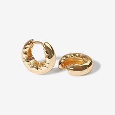 Get ready to elevate your style with our Kenny puffy helium hoop earrings in gold! These bold hoops add a playful touch to any outfit, making it impossible to go unnoticed. So go ahead, put up your hair and let these earrings be the star of the show. A must-have for any fashion-forward individual. (Earrings do not actually float.) Chic 14k Gold Filled Hoop Earrings, Trendy 14k Gold Filled Huggie Earrings, Chic Hoop Huggie Earrings For Pierced Ears, Chic Small Hoop Tarnish Resistant Huggie Earrings, Chic Tarnish-resistant Small Hoop Huggie Earrings, Trendy Small Hoop Yellow Gold Earrings, Chic Small Hoop Gold Plated Huggie Earrings, Trendy 14k Gold-filled Huggie Earrings For Everyday, Trendy Single Small Hoop Earring