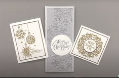 three christmas cards with gold and silver foil on the front, two are white and one is