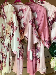 "Introducing our new exclusive gorgeous Dusty Rose Floral Robes Collection! * Premium luxurious high quality soft stretchy satin with spandex mix. * Beautiful Digital Floral Print. * Belt loops and inside ties. * Outside matching decorative belt. * Comes beautifully packaged ready for gifting. 💎ORDER INSTRUCTIONS💎 💎CLICK ON THE DROP DOWN MENU FOR SIZES, CUSTOM OPTIONS, AND PRICING One (Plus/Junior/Kids) Size Robe only - no writings on the robe; One (Plus/Junior/Kids) Size Front - you can choo Pink Bridesmaid Dress For Wedding, Pink Feminine Bridesmaid Dress For Wedding, Feminine Pink Bridesmaid Dress For Wedding, Rose Bridesmaid, Silk Bridesmaid Robes, Satin Bridesmaids Robes, Bridesmaid Robes Floral, Wedding Robes, Custom Robes