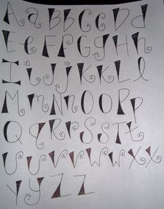 the letters are drawn on paper with black ink and have different shapes, sizes, and colors