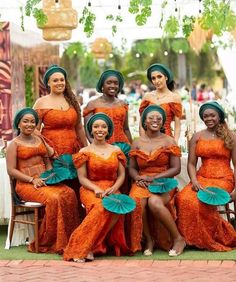 a group of women sitting next to each other