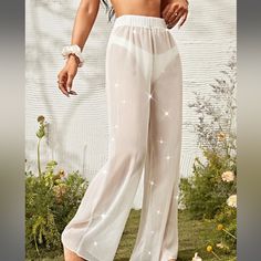 Brand New Never Worn. Metallic Thread , Sheer Trendy Sheer Summer Bottoms, Sheer Trendy Bottoms For Summer, Trendy Sheer Bottoms For Spring, Sheer Trousers Bottoms For Spring, Sheer Trousers For Spring, Chic Sheer White Bottoms, Chic White Sheer Bottoms, Sheer Summer Pants, Chic Sheer Beach Bottoms