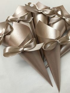 some very pretty metallic cones with bows on them