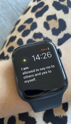 an apple watch on someone's wrist that says i will focus or progress, not perfection