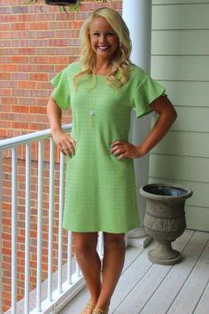 Uncle Frank: Maria Dress, Green Spring Solid Color Dress With Bell Sleeves, Spring Solid Color Bell Sleeve Dress, Solid Bell Sleeve Dresses For Spring, Green Flutter Sleeve Dress With Ruffle Hem, Green Dress With Ruffle Hem And Ruffle Sleeves, Green Dress With Ruffle Hem And Sleeve, Green Short Sleeve Dress With Ruffle Hem, Uncle Frank, Green With Envy