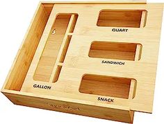 a wooden tray with compartments for different items