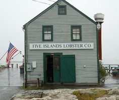 the five islands lobster company is located in an old building on the water's edge