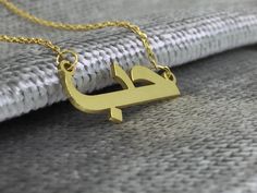 Arabic Name Necklace, Personalized Arabic Necklace, Custom Arabic Necklace, Personalized jewelry, Name Necklace, Moms Gift, Birthday Gift Gold This perfect Arabic name necklace is the perfect gift for your loved ones. You can personalise this name necklace as you wish. * The size of the necklace can be small or large depending on the letter! *Custom Name Necklace will be handmade with your desired name.You can have your own name personalized on this necklace. * Material: High Quality 585 14K Sol Gold Custom Pendant Necklace For Personalized Gift, Custom Gold Pendant Necklace For Personalized Gift, Handmade Gold Necklace For Anniversary, Handmade Gold Custom Necklace For Anniversary, Handmade Yellow Gold Name Necklace Pendant, Handmade Yellow Gold Pendant Name Necklace, Handmade Yellow Gold Nameplate Necklace, Gold Hallmarked Necklace For Personalized Gift, Gold Pendant Name Necklace For Wedding