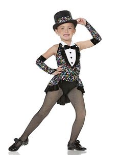 a young boy in a tuxedo and top hat posing for the camera with his hands on his hips