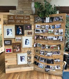 a wooden wall with pictures and photos on it