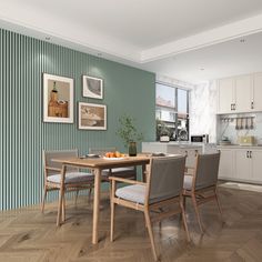 a dining room table and chairs in front of a green wall with vertical striped walls