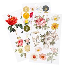 three stickers with flowers on them