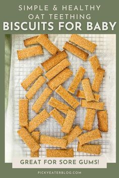 some crackers are sitting on top of a sheet of paper with the words, simple and healthy biscuits for baby great for sore gums