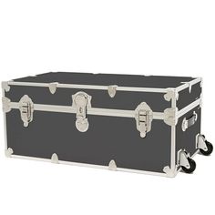 the trunk is black and white with silver trimmings on the bottom, and two handles