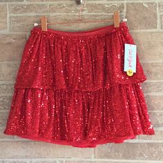 Cat & Jack Red Sequins Layered Skirt Size L (10/12) Lined Elastic Waistband New With Tags Cute Tiered Skirt For Party, Cute Fitted Red Bottoms, Cute Fitted Red Skirt, Red Festive Holiday Skirt, Red Holiday Festive Skirt, Festive Red Holiday Skirt, Red Festive Skirt For Spring, Red Christmas Skirt For Festive Occasions, Red Skirt For Winter Holiday