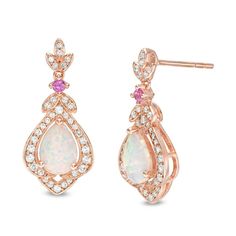 Create a beautiful look with these elegant drop earrings. Fashioned in sterling silver and 14K rose gold plate, each earring showcases a 7.0 x 5.0mm pear-shaped lab-created iridescent opal cabochon centered in a flower-shaped frame adorned with lab-created shimmering white sapphires. Duos of additional created sapphires grace a leaf trio positioned above a lab-created bright pink sapphire. Buffed to a brilliant luster, these post earrings secure comfortably with friction backs. Exquisite Rose Gold Drop Earrings, Pink Gold Sterling Silver Fine Earrings, Pink Gold Sterling Silver Earrings Fine Jewelry, Rose Gold Chandelier Earrings For Anniversary, Elegant Pink Sterling Silver Bridal Earrings, Elegant Rose Gold Earrings In Fine Jewelry Style, Formal Rose Gold Sterling Silver Bridal Earrings, Elegant Rose Gold Earrings Fine Jewelry, Rose Gold Sterling Silver Drop Bridal Earrings