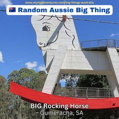 an advertisement for the big rocking horse in gumerach, sa is featured on top of a building