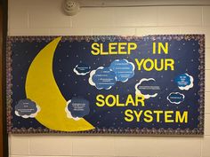 a bulletin board with the words sleep in your solar system on it and clouds above