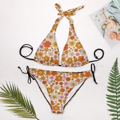 Halter Bikini Set, Two Piece bikini set, Orange Bikini, 70s style, 70s inspired swimsuit, 70s inspired bikini, Women's bikini, Floral Bikini A cute 70s inspired bikini with cute orange and pink floral pattern print. Gorgeous halter top with ties. Matching bikini bottom. A great retro 70s hippie style find. I hope you enjoy this design I created.